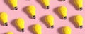 The yellow lightbulbs creating a vibrant pattern on a pink background..AI generated image Royalty Free Stock Photo