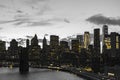 Yellow lights in black and white skyline scene of Lower Manhattan buildings in New York City Royalty Free Stock Photo