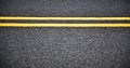 Yellow line on asphalt. Royalty Free Stock Photo