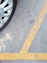 The yellow line divide the parking space on asphalt pavement of the mall Royalty Free Stock Photo