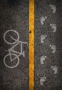 Yellow line on the high way saperate for bicycle and walk lane. Royalty Free Stock Photo