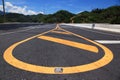 Yellow line on highway with mountain view and blue sky Royalty Free Stock Photo