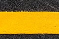 Yellow line on new asphalt detail Royalty Free Stock Photo