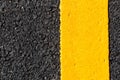 Yellow line on new asphalt detail Royalty Free Stock Photo