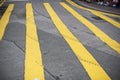 Yellow lines painted on the road, showing traffic rules guide. Royalty Free Stock Photo