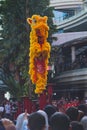 The Yellow Lion Dance is walking on high pole platform