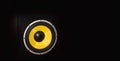 Yellow loudspeaker close on the dark background close up shot Royalty Free Stock Photo