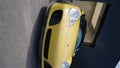 Yellow Luxury Sportier, Porsche 911 Turbo leaves the garage, Vertical Video