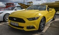 Yellow luxury sports car Ford Mustang convertible is presented at the etro car festival in Kyiv