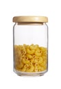 Yellow macaroni in bottle Royalty Free Stock Photo