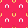 Yellow Magnet icon isolated seamless pattern on red background. Horseshoe magnet, magnetism, magnetize, attraction Royalty Free Stock Photo