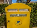 Yellow mailbox of the French public company La Poste