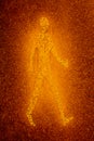 Yellow Man Glowing on Orange Speckled Background