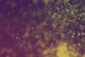 Yellow many falling sparkles one color bokeh texture - wonderful abstract photo background Royalty Free Stock Photo