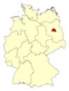 Yellow map of Germany with federal state Berlin isolated in red.