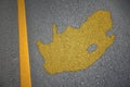 yellow map of south africa country on asphalt road near yellow line