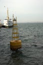 Yellow marker buoy on the Black Sea Royalty Free Stock Photo