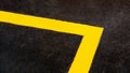 Yellow markings angle of the new highway with tarmac road surface. Royalty Free Stock Photo