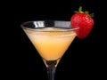 Yellow martini cocktail drink decorated with strawberry Royalty Free Stock Photo