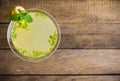 Yellow martini cocktail with lemon and mint Royalty Free Stock Photo