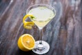 Yellow martini cocktail with lemon and mint Royalty Free Stock Photo