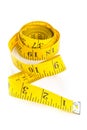 Yellow measure tape on white background Royalty Free Stock Photo