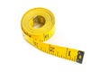 Yellow measure tape on white background Royalty Free Stock Photo