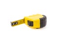 Yellow measuring tape isolated on background. Royalty Free Stock Photo