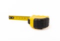 Yellow measuring tape isolated on background. Royalty Free Stock Photo