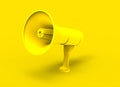 Yellow megaphone on yellow background