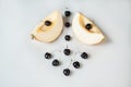 Compisition on white background with fruit. Melon and cherrys