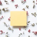 Yellow memo paper and floral pattern on white background Royalty Free Stock Photo