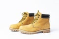 Yellow men`s work boots from natural nubuck leather isolated on white background. Trendy casual shoes, youth style. Concept of Royalty Free Stock Photo