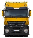 Yellow Mercedes Actros truck with black plastic bumper.