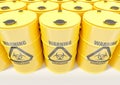 Yellow metal barrels with black biohazard warning sign on white background Royalty Free Stock Photo