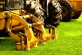 Yellow metal mechanical part attached to bulldozer, heavy duty construction machinery