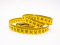 Yellow metric measuring tape on white background Royalty Free Stock Photo