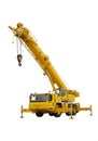 Yellow mobile crane with extendable arm and hook on a white background. The crane Royalty Free Stock Photo