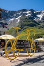 A yellow model bicycle at the Col du Lautaret