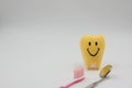 Yellow model smile Cute toys teeth in dentistry on a white background Royalty Free Stock Photo