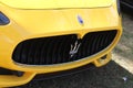 Yellow modern Maserati front details closeup