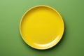 Yellow Monochrome Plate On Green Background, Top View. Generative AI