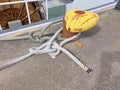 Yellow mooring bollard with ropes Royalty Free Stock Photo