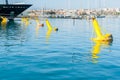 Yellow mooring buoys blue luxury boat bow in marina at Port Vauban, Antibes Royalty Free Stock Photo