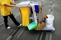 Yellow mop bucket and set of cleaning equipment in the airport Royalty Free Stock Photo