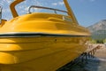 Yellow motor boat on the beach.