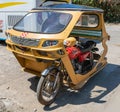 Yellow motor-tricycle taxi in Puerto Princesa, Palawan, Philippines