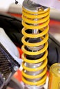 Yellow motorcycle shock absorbers. Royalty Free Stock Photo