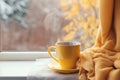 Yellow mug drink scarf window. Generate Ai