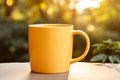 Yellow Mug on Wooden Table. Bright and Invigorating Morning Coffee or Tea Concept. Mockup. Text